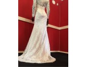 снежно бяла дантелена булчинска рокля с паднали рамене и 7/8 ръкав